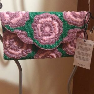From St-Xavier pink and green bedded clutch